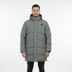 Man wearing a gray puffer coat on a white background